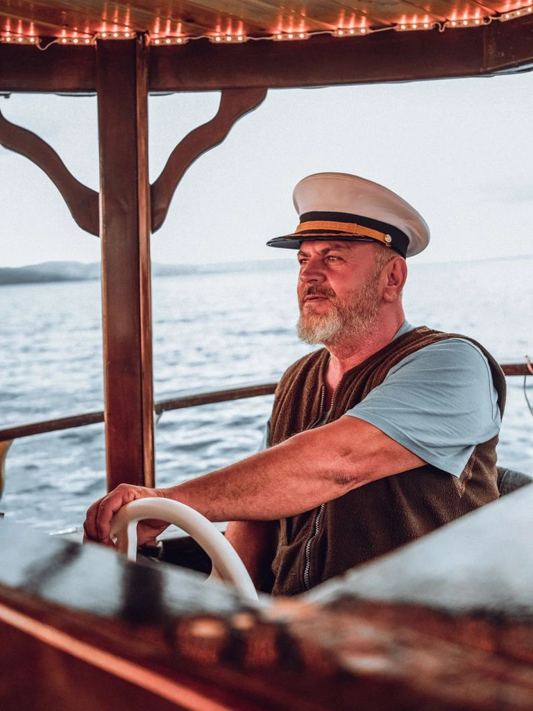 Captain Mike Lambrecht on the deck of a Silent World dive boat.